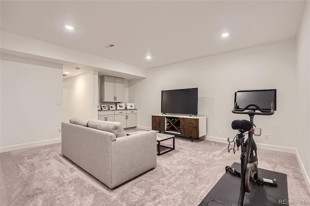 living room featuring light colored carpet