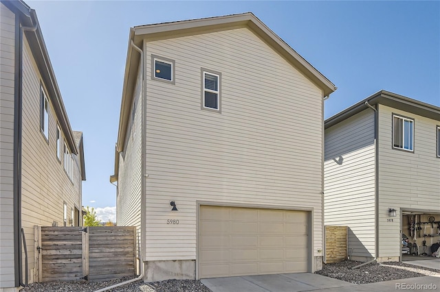 view of property exterior featuring a garage