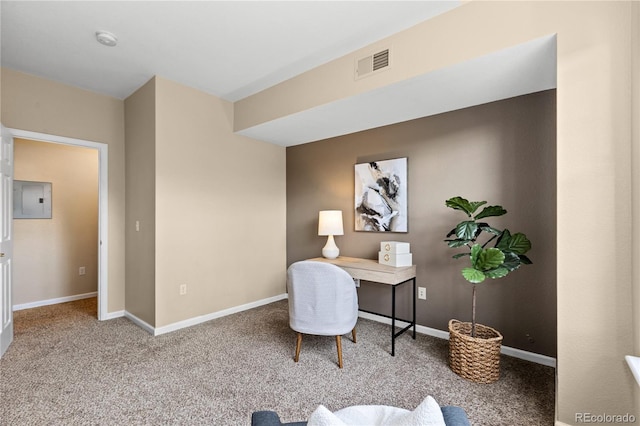 carpeted office with electric panel, baseboards, and visible vents