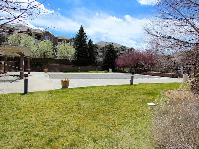 view of yard featuring a residential view