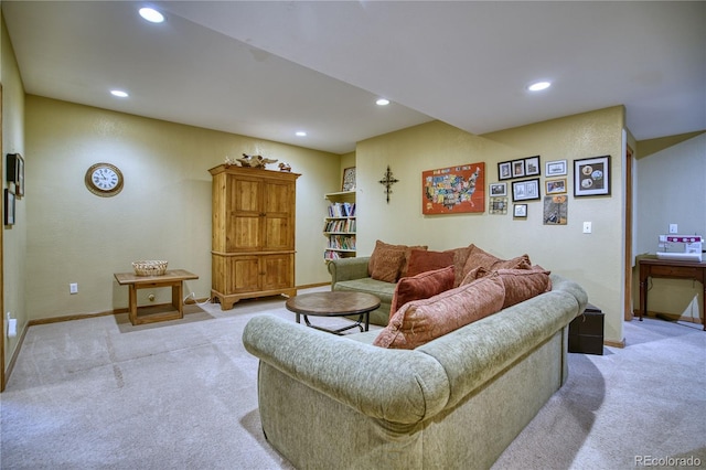 living room with baseboards, recessed lighting, and light colored carpet