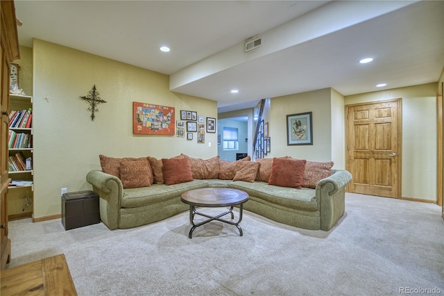 living room featuring baseboards, recessed lighting, visible vents, and carpet
