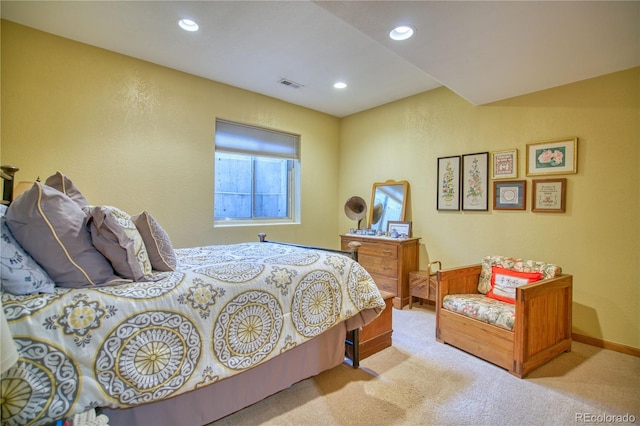 carpeted bedroom with baseboards, visible vents, and recessed lighting