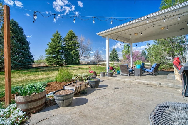 view of patio featuring fence