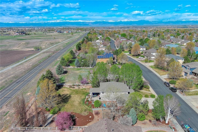 aerial view with a mountain view and a residential view