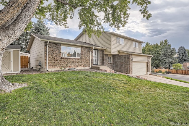 split level home with a garage and a front lawn