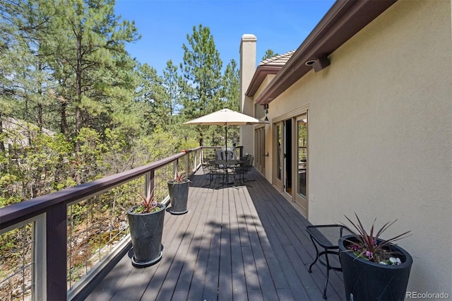 474 Silbrico Way, Castle Rock, CO 80108 - wooden terrace with outdoor dining area