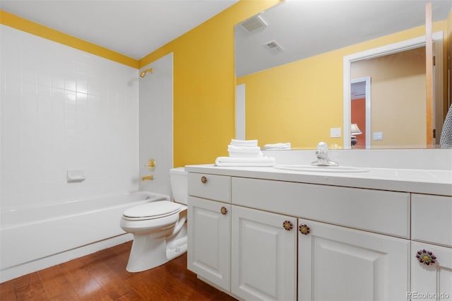 474 Silbrico Way, Castle Rock, CO 80108 - bathroom featuring toilet, vanity, wood finished floors, and tub / shower combination
