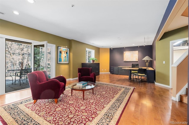 474 Silbrico Way, Castle Rock, CO 80108 - living room with recessed lighting, wood finished floors, an office area, baseboards, and stairs