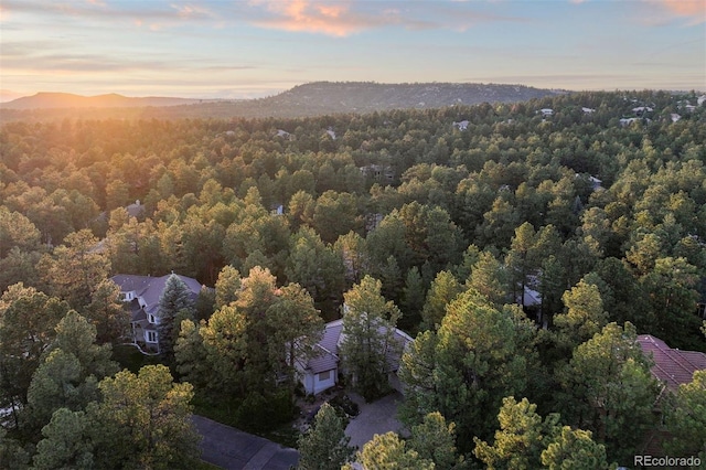 474 Silbrico Way, Castle Rock, CO 80108 - aerial view of a heavily wooded area and a mountain backdrop