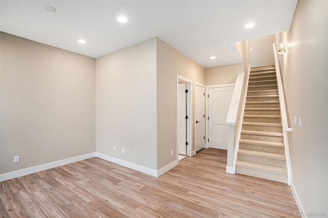 unfurnished room with light hardwood / wood-style flooring