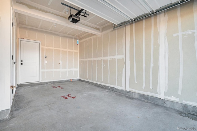 garage featuring a garage door opener