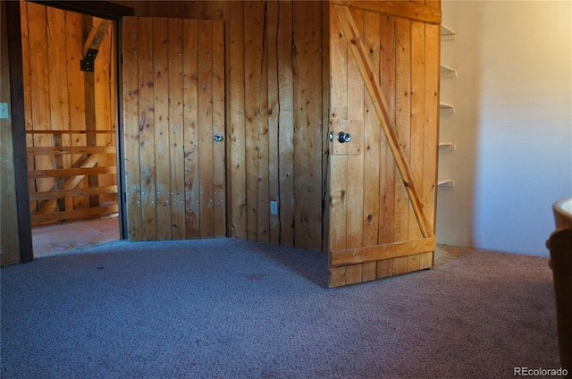 interior space featuring wooden walls