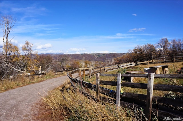 view of road featuring a rural view