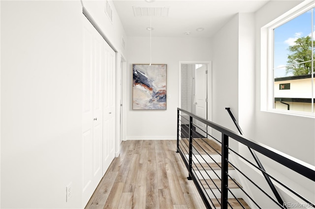 hallway featuring light wood-type flooring