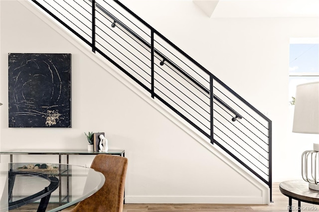 stairway with wood-type flooring