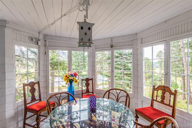 sunroom with wood ceiling