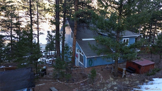 56216 US Highway 285, Shawnee, CO 80475 - view of home's exterior featuring roof with shingles