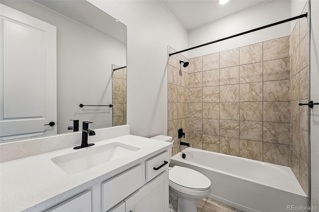 full bathroom featuring toilet, vanity, and shower / washtub combination