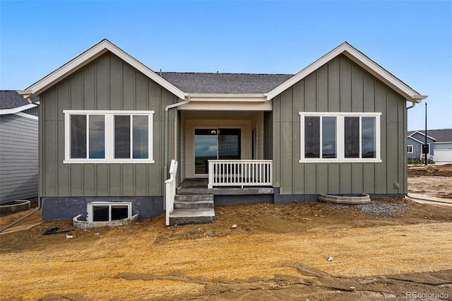 view of front of property featuring covered porch and board and batten siding