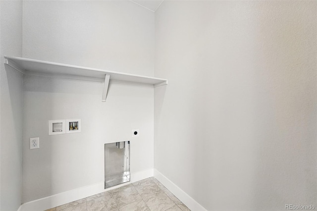 washroom with hookup for a washing machine, baseboards, and hookup for an electric dryer