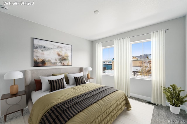 17125 W 92nd Loop, Arvada, CO 80007 - bedroom with light colored carpet and baseboards