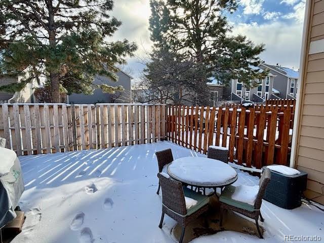 view of yard layered in snow