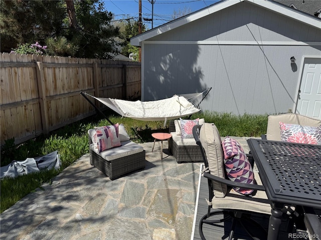 613 S Logan St, Denver, CO 80209 - fenced backyard featuring outdoor dining area, a patio, and an outdoor living space