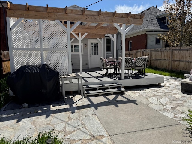 613 S Logan St, Denver, CO 80209 - view of patio featuring a grill, a pergola, and outdoor dining space