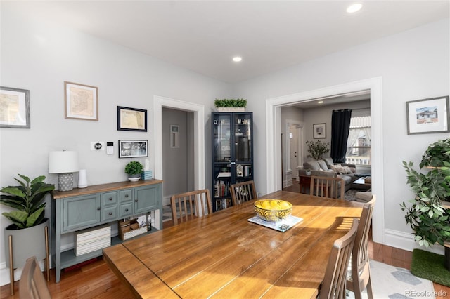 613 S Logan St, Denver, CO 80209 - dining room featuring wood finished floors and recessed lighting