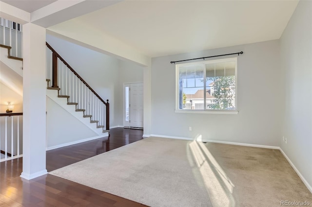 entrance foyer featuring dark hardwood / wood-style floors