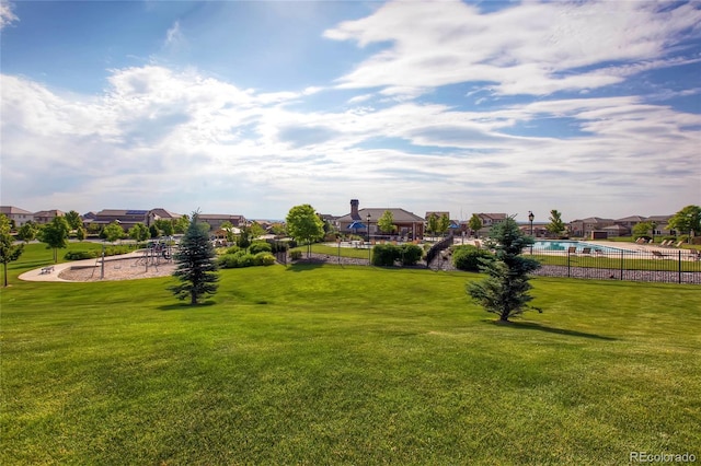 view of home's community featuring a yard