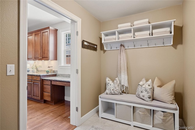 11674 Newton St, Westminster, CO 80031 - mudroom featuring baseboards and light wood-type flooring