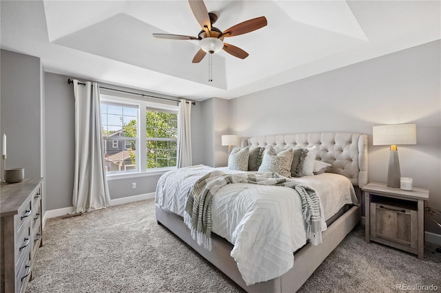 11674 Newton St, Westminster, CO 80031 - bedroom with a raised ceiling, light colored carpet, and a ceiling fan