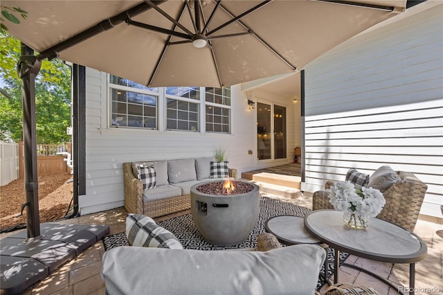 11674 Newton St, Westminster, CO 80031 - view of patio with an outdoor living space with a fire pit