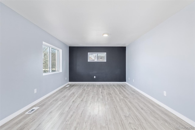 empty room featuring light hardwood / wood-style floors