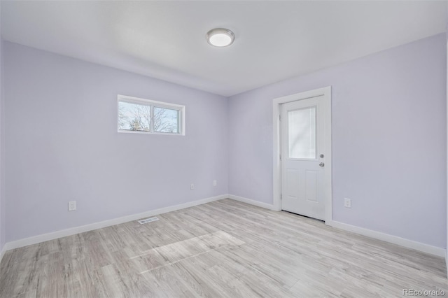 empty room featuring light wood-type flooring