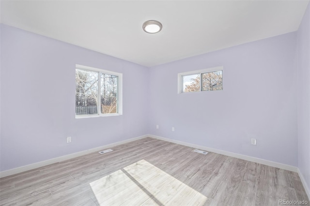 empty room featuring light hardwood / wood-style floors