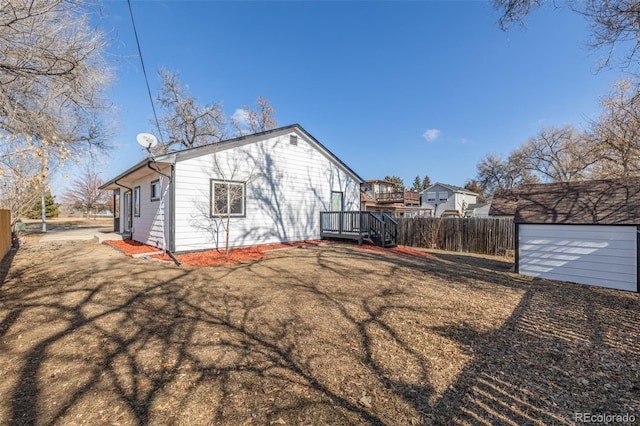 rear view of property with a yard