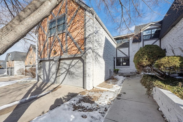 view of property exterior with a garage