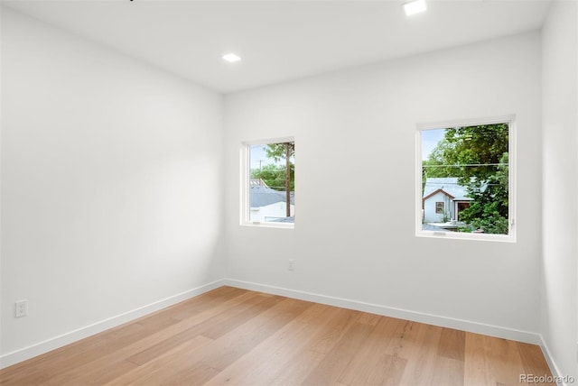 1518 S Columbine St, Denver, CO 80210 - spare room featuring plenty of natural light, light wood-style flooring, baseboards, and recessed lighting