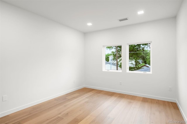 1518 S Columbine St, Denver, CO 80210 - unfurnished room with baseboards, light wood-style flooring, and recessed lighting