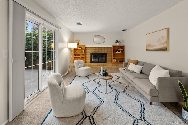 3458 S Norfolk Way, Aurora, CO 80013 - living room with a brick fireplace, carpet flooring, and a textured ceiling