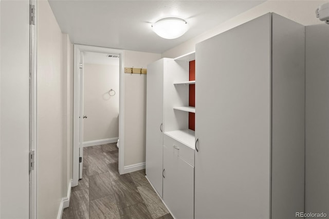 3458 S Norfolk Way, Aurora, CO 80013 - corridor featuring baseboards