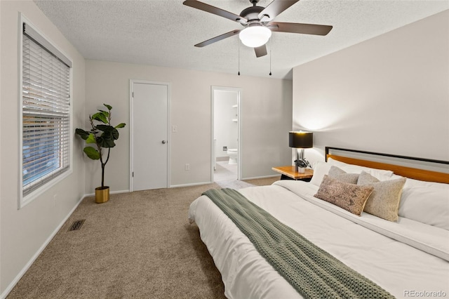 3458 S Norfolk Way, Aurora, CO 80013 - bedroom featuring carpet flooring, a textured ceiling, ensuite bathroom, and a ceiling fan