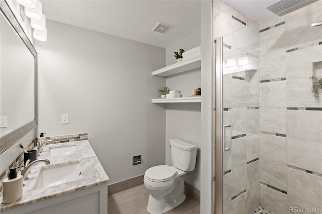 3458 S Norfolk Way, Aurora, CO 80013 - full bathroom featuring double vanity and a stall shower