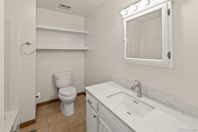 3458 S Norfolk Way, Aurora, CO 80013 - bathroom featuring vanity, tile patterned flooring, and a tub to relax in