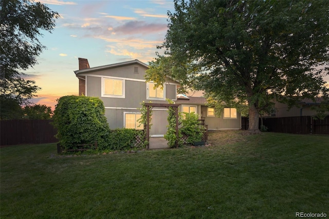 3458 S Norfolk Way, Aurora, CO 80013 - view of front of home with a chimney