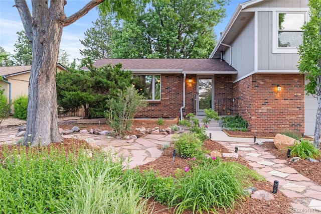 3458 S Norfolk Way, Aurora, CO 80013 - tri-level home with brick siding and roof with shingles
