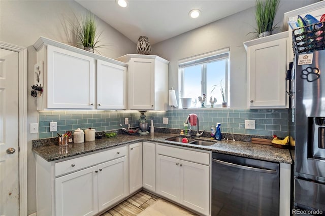 7601 Ronan Ct, Fountain, CO 80817 - kitchen featuring a sink, white cabinetry, and appliances with stainless steel finishes
